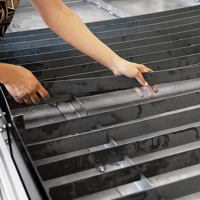 Water pan slats on one of our CNC plasma cutter tables